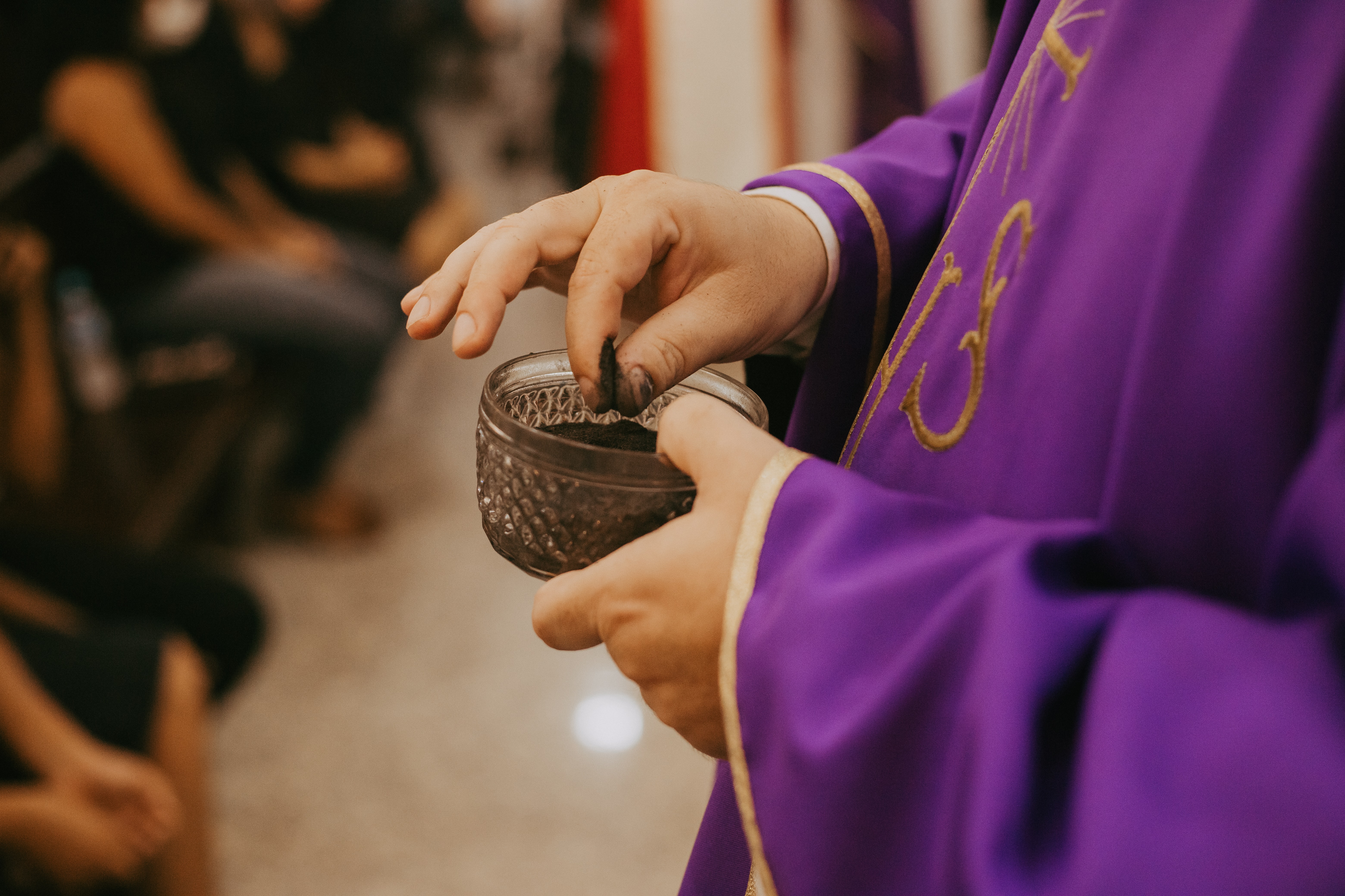 Catholic Priest Administering Ashes